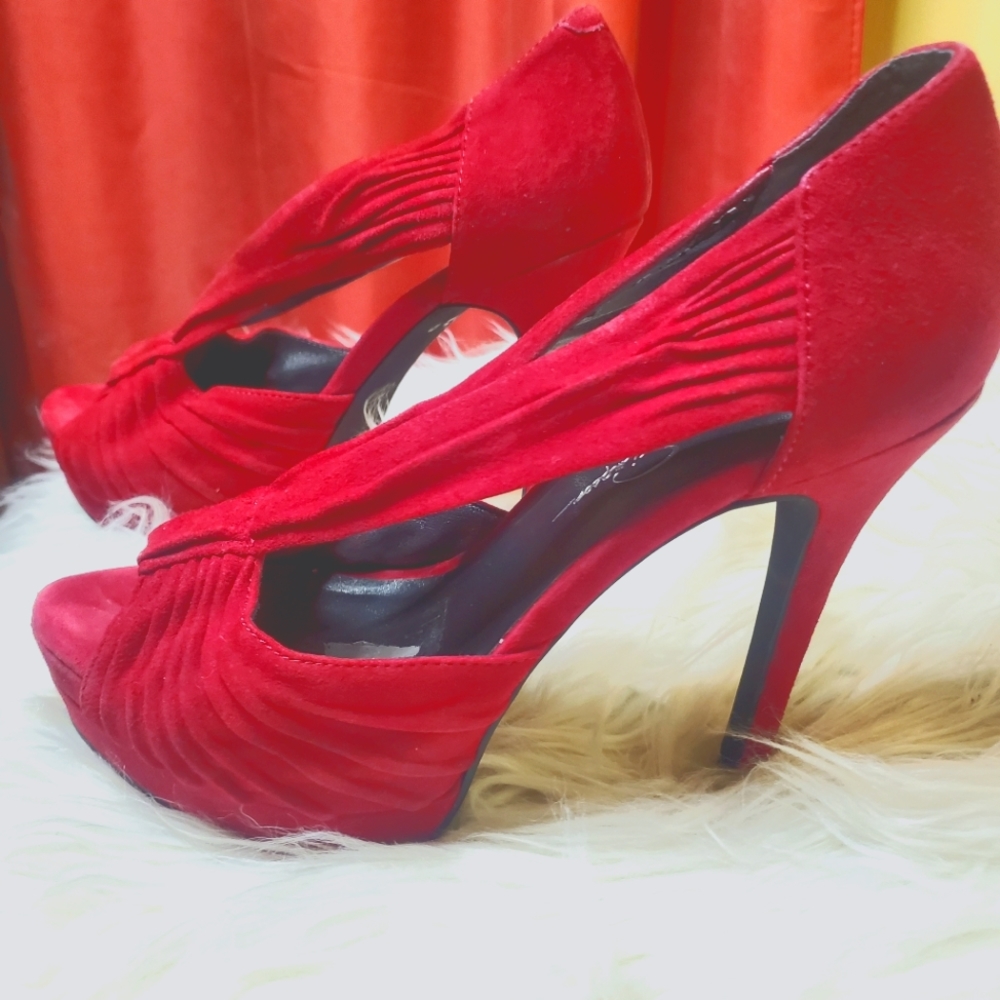 Jessica Simpsom red suede stiletto heels.